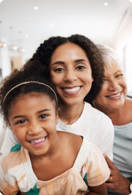 Three generations of women sharing smiles